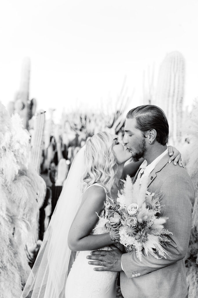 Bride and Groom first kiss, at cactus country elopement